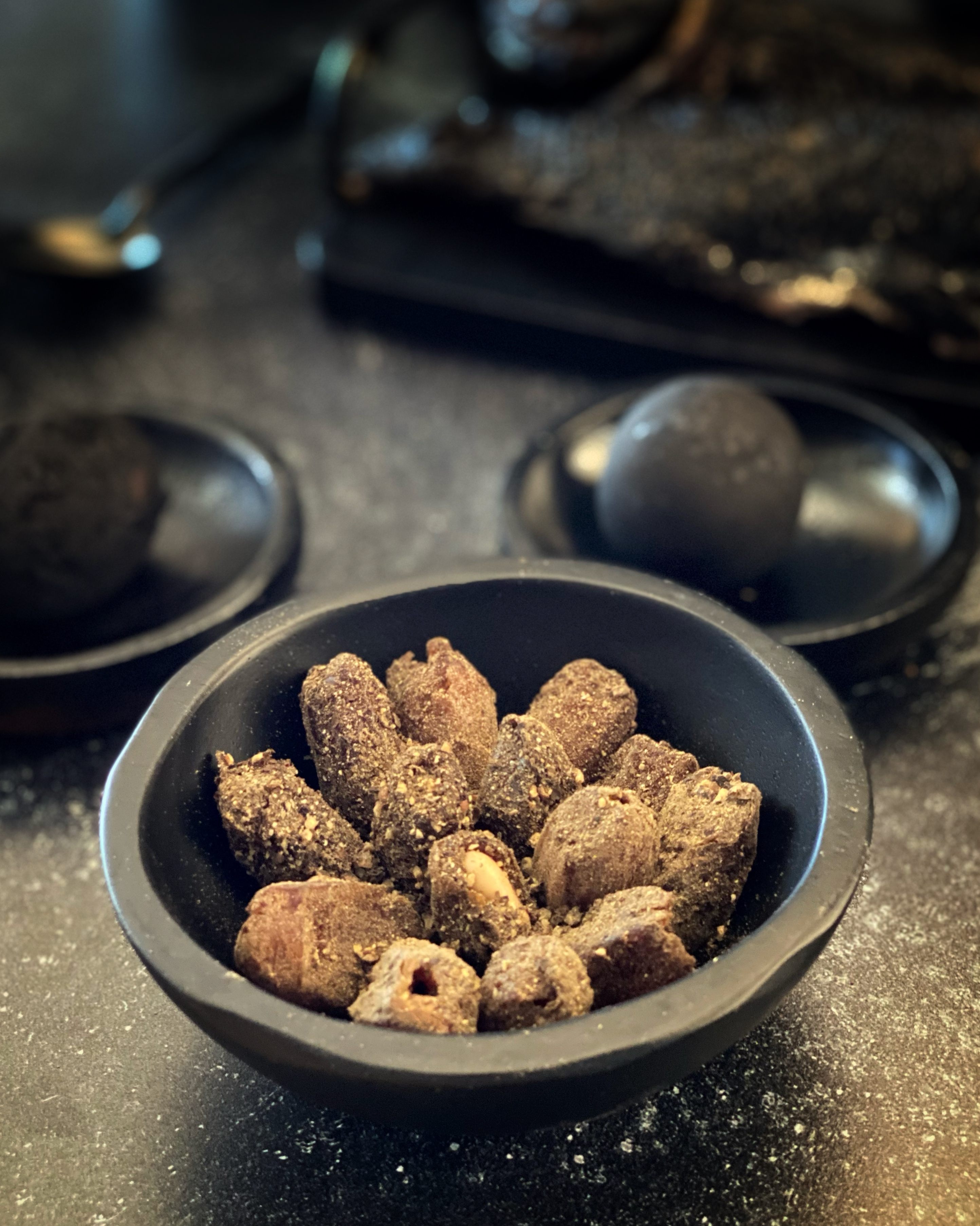 Monaco notes that the blackness of the banquet may have been a satirical dig at the overuse of black pepper.
